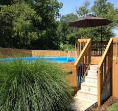 Top above ground pool your go to buying guide. How To Hide An Above Ground Pool In A Landscaped Backyard Hawk Hill