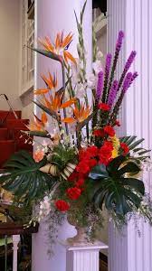 Maybe you would like to learn more about one of these? Large Arrangement Of Bird Of Paradise Liatris White Gladiolus Red And Peach Tropical Flower Arrangements Funeral Floral Arrangements Red Flower Arrangements