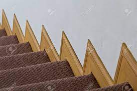 From the baseboard to the railing molding, there are countless areas in which to show off your aesthetic panache. Red Carpet On Stairs And Wood Trim On The Walls Stock Photo Picture And Royalty Free Image Image 18298850