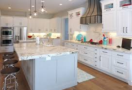 It is highly suited for small kitchens too, as it makes it appear bigger. White Kitchen Cabinets With Granite Countertops Design Ideas