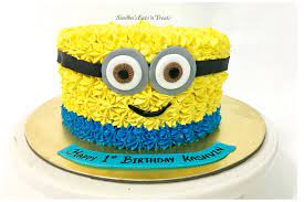 A good idea is to bake a minion cake of your choice and then bake cupcakes with different style of minion faces over it. Minion Theme Smash Cake Minion Birthday Cake Birthday Cake Kids Buttercream Birthday Cake