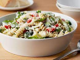 1½ cups freshly grated parmesan cheese, plus extra for serving combine the cherry tomatoes, ½ cup olive oil, garlic, basil leaves, red pepper flakes, 1 teaspoon salt, and the pepper in a large bowl. Lemon Fusilli With Arugula Recipe In 2020 Food Network Recipes Arugula Recipes Recipes