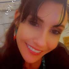 He trusts her completely, that's why he wants a signed document, so  everyone else can trust her too.