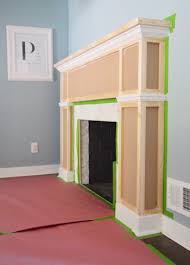 You can match pebble textures tiles with your existing décor, or use them as a contrast piece to add a bit of flair to your fireplace. Our 200 Fireplace Makeover Marble Tile A New Mantel Young House Love