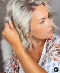 Hair stylist near Centennial Hills for blonde highlights