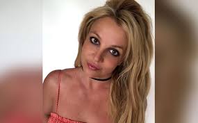 All you need is love and the beach …. Britney Spears Leaves Her Fans Bamboozled With Her New Video