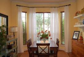 Judith explains this is done using brackets, evenly placed above the window frame. How To Choose The Right Curtains Blinds Shades And Window Treatments For Your Doors And Windows Dining Room Curtains Living Room Windows Window Treatments Living Room