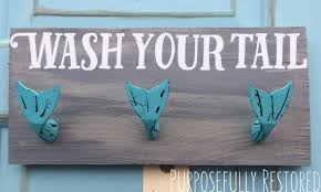 While You Re At It Make The Hooks Fun Like These Mermaids Mermaid Bathroom Mermaid Bathroom Decor Sea Bathroom