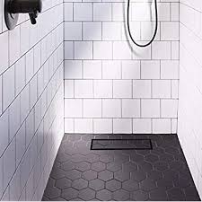 Score a line around the shower floor's perimeter at the mark representing the floor's slope, using a bubble level as a guide. Buy Neodrain 12 Inch Linear Shower Drain With 2 In 1 Flat Tile Insert Cover Brushed 304 Stainless Steel Rectangle Shower Floor Drain Floor Shower Drain With Shower Drain Base Hair Strainer Black Online In Indonesia
