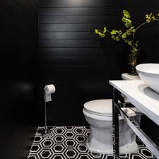 And it's not going away, even after the current frenzy (inevitably) subsides. Create A Modern Powder Room Using Black Shiplap