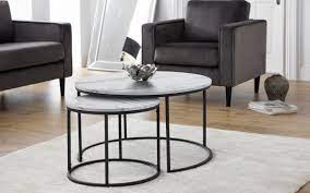 A coffee table can have different shapes: Bellini Round Nesting Coffee Table White Marble Effect Landlord Furniture Uk