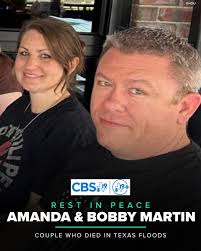 Family grieving loss of parents in flood