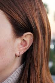 4 Multiple Earring Looks To Try Now Le Fashion Multiple Earrings Ear Piercing For Women Cute Ear Piercings