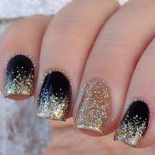 Black And Gold Glitter Nails Pin By Jade Johnson On Hair Nails Makeup Ombre Nails Glitter Gold Nails New Years Eve Nails