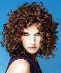 The volume created by the layers helps to elongate the face as well as let your locks flow with natural grace and beauty. Curly Hairstyles To Suit Your Face Shape