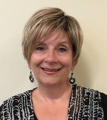 Kim looks great in Natalie by Jon Renau in 12FS8 (Shaded Praline). To shop  for Natalie, go to  https://www.wigsbypattispearls.com/natalie-synthetic-wig-by-jon-renau.html