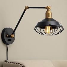 Black And Gold Lighting Fixtures Zelda Matte Black And Gold Industrial Cage Wall Lamp 55k56 Lamps Plus Wall Lamp Plug In Wall Lamp Black Wall Lamps