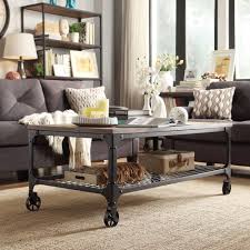 This Modern Coffee Table Features Wheels A Weathered Top And Sturdy Metal Base With Shelf For Extra Rustic Living Room Furniture Sofa End Tables Coffee Table