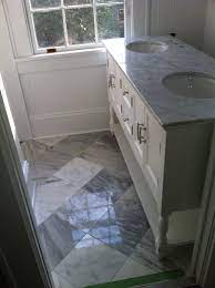 Classic carrera marble bathrooms with floating sinks. The Luxe Lifestyle White Marble Bathrooms Grey And White Marble Bathroom Marble Bathroom Designs