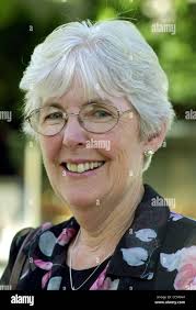 In this photo taken Friday June 28, 2013 Teri Knight poses with her twin  daughters Mallory, left, and Molly in Bow, N.H. It's been 10 years since  Knight's children from a previous