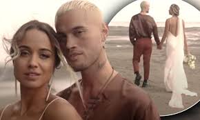 Singer Stan Walker marries partner Lou Tyson and shares video of their  intimate wedding
