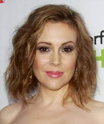 Alyssa Milano Medium Wavy Copper Blonde Hairstyle With Light Blonde Highlights Alyssa Milano Hair Copper Blonde Hair Color Hairstyle