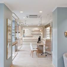L Atelier Optique Creation D Un Magasin Design A L Atmosphere Scandinave Vaires Sur Marne Pisi Design Studio Design Studio Design Optique