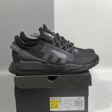 Adidas launched the nmd model in 2015, and it instantly became one of their best selling models! Adidas Originals Nmd R1 V2 Core Black Carbon Shock Yellow