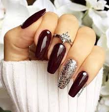 Just like a red lip look, a red mani is a power statement. Dark Red Oxblood Nails Glitter Accent Nails Nexgen Nails