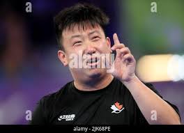 Singapore's Zhe Yu Clarence Chew and Shao Feng Ethan Poh, right, compete  during the men's doubles bronze medal table tennis match against  Australia's Nicholas Lum and Finn Luu at the Commonwealth Games