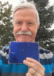 Edmonton man Adrian Pearce opens gift after 47 years
