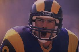 A young Ken Stabler calls out the signals at the line of scrimmage against  the Denver Broncos in 1971.