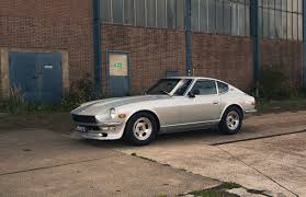 Image result for Gray 1970 Datsun