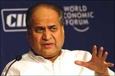 Bajaj, brother hand over stakes in each other's co