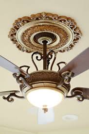 We had our electrician install a minka aire simple fan (model f787) in our master bedroom. Project Spotlight Mediterranean Dream Home In Gainesville The Evans Edit Minkaaire Napoli Project Spotlight Mediterranean Ceiling Fans Ceiling Medallions