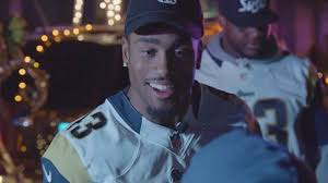 Rams Join LAPD for Santa Sleigh Ride Through Watts