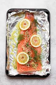 Giada de laurentiis cooks salmon baked in foil | food network. Baked Salmon In Foil With Lemon Dill Fit Foodie Finds