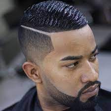 In this hairstyle, the top is kept short and neat while a voguish center part is created using clippers. Pin On Beard Life