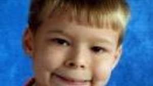 Driver charged in death of 7-year-old