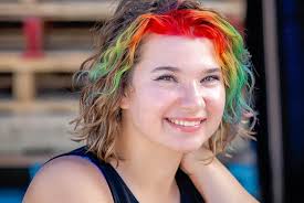 Getting some editing done for this colorful senior @egg_eggington3 and  loving these photos we captured her fun personality and expression of the  love of art .