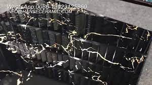 Floor tiles can vary in design, texture, colour and material so there are a multitude of options available so there will be something suitable for all installation areas. Black Gold Color Ceramic Tiles Black Gold Porcelain Floor Tiles Youtube