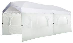 This canopy acts as a car port to protect your vehicle from the weather and provides shelter for outdoor activities. Ozark Trail 10x20 Straight Leg Instant Canopy Includes Carry Bag 6 Sidewalls Stakes And Tie Out Lines Walmart Com Walmart Com