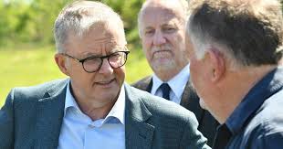 Prime Minister Anthony Albanese hears about flood damage from Latrobe's  Michael Perkins