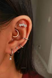 Simple Multiple Cartilage Ear Piercing Ideas Flower Earring Studs Hoop Rings Www Impuri In 2020 Belly Piercing Jewelry Nose Piercing Jewelry Flower Earrings Studs