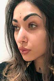 Tips And Tricks To Learn Before Getting A Nose Piercing Facial Piercings Face Piercings Nose Piercing