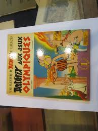 Clovis cornillac, gérard depardieu, benoît poelvoorde and others. Une Aventure D Asterix Le Gaulois Asterix Aux Jeux Olympiques Von Uderzo Goscinny 1968 Librairie Fauguet