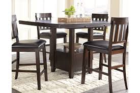 Additional chairs are available as an option. Haddigan Counter Height Extendable Dining Table Ashley Furniture Homestore