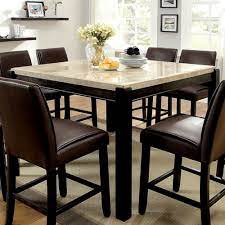 The set includes a sleek transitional table with a gleaming faux marble top and four. Red Barrel Studio Janeta Counter Height Pedestal Dining Table Wayfair