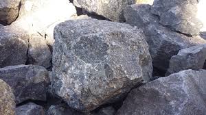 This type of igneous rock originates when lava erupts very rapidly from deep in the earth's mantle, leaving behind a narrow pipe of this greenish brecciated rock. Monday Geology Picture Kimberlite In Kimberley Georneys Agu Blogosphere