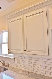 Painted Custom Cabinets White Subway Tile With Mocha Brown Grout Condo Kitchen Remodel Cheap Kitchen Remodel Simple Kitchen Remodel